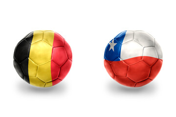 football balls with national flags of belgium and chile ,soccer teams. on the white background.