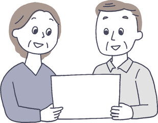 パンフレットを読む老夫婦