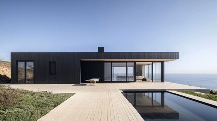 Obraz premium Ocean-view house with minimalist architecture, spacious terrace, and modern exterior