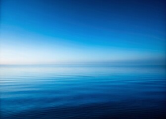 Obraz premium Minimalist Photography of a Smooth Blue Gradient Background with Subtle Textures for a Serene and Calming Atmosphere, Perfect for Modern Design Projects or Artistic Displays