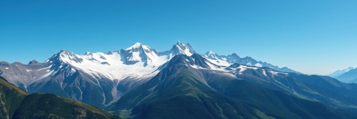 Obraz premium A stunning photograph of a majestic mountain range with snow-capped peaks and lush green valleys below, hiking, landscape