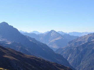 Fototapeta premium Scenic view of rugged mountains, majestic, steep