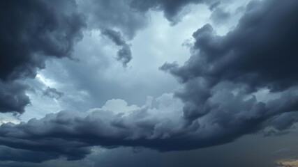 Dark, ominous storm clouds gathering in the sky before a thunderstorm, moody, weather