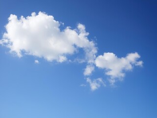 Beautiful blue sky background with fluffy white clouds creating a serene and peaceful atmosphere, Sky, Fluffy