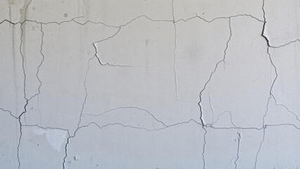 Obraz premium Rough and gritty gray wall with peeling paint and cracks, wall, gray