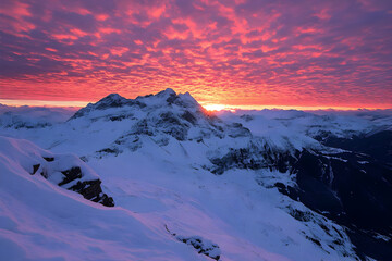 Pink Sunset over Snowy Mountains