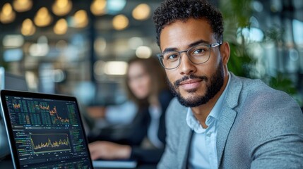Fototapeta premium Focused and Confident Businessman Analyzing Financial Data and Statistics on Computer Screen in Modern Office Environment