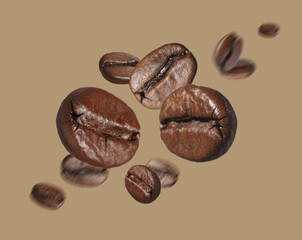 Fototapeta premium Aromatic roasted coffee beans in air on dark beige background
