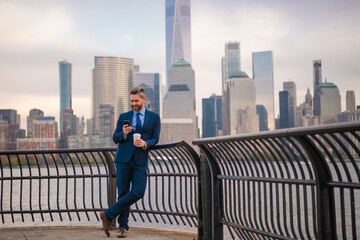 Business man outdoors work occupation lifestyle. Business man and city. Business career with goal. Businessman and skyscraper. Businessman near office building in Manhattan, New York city.