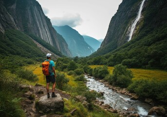 Fototapeta premium Hiker Admiring Mountain Valley Landscape
