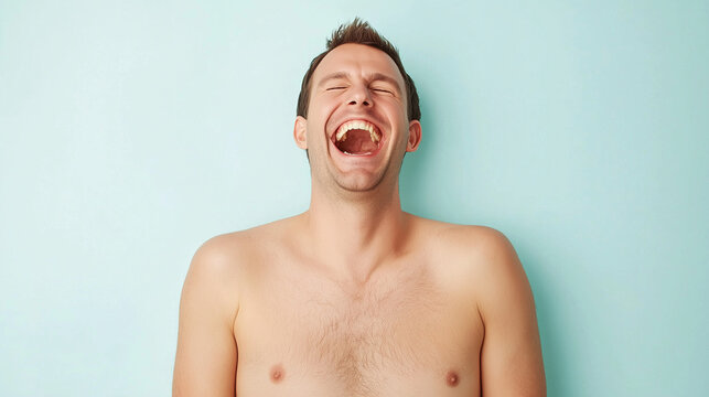 Unbridled Joy: A shirtless man throws his head back, laughing uproariously against a pastel blue background.  A portrait that captures pure, unadulterated happiness. 