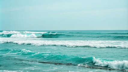 Fototapeta premium Abstract turquoise background with ocean waves breaking in the distance over a calm sea, abstract art, wave movement, ocean waves