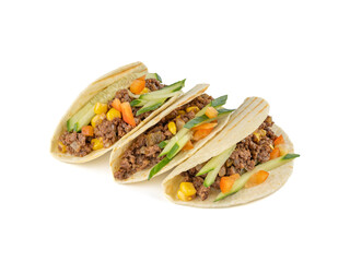 Tacos with minced beef jalapeno peppers and fresh vegetables. Close-up. Isolate. White background.