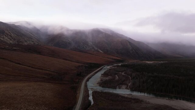 Dempster Highway Through Ogilvie Mountains In Yukon, Canada - Aerial Shot