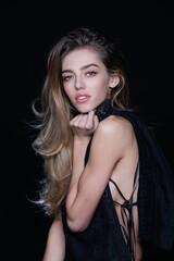 Naklejka premium Fashion model. Fashionable young woman. Portrait of a gorgeous fashion young woman. Elegant Lady. Beautiful Model. Fashion portrait of elegant woman. Fashion make up.