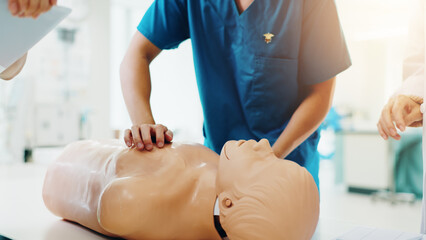 Dummy, student and cpr training in clinic for medical simulation exam, test or assignment....