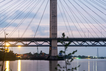 Obraz premium Shwe Pyi Thar Bridge at sunset, Yangon