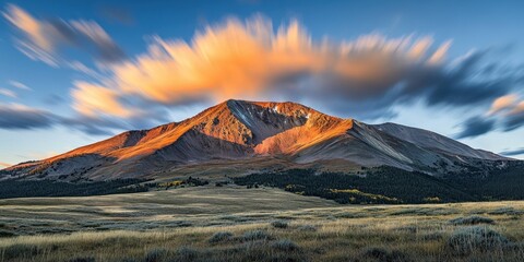 Sunlit clouds Alpine peak Time-lapse of clouds moving