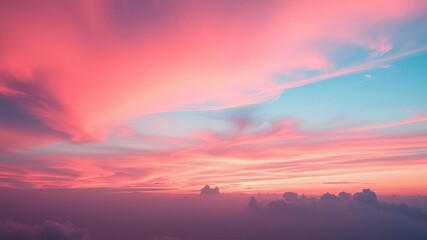 Fototapeta premium Soft pink hues merge with deep blues as a swirling vortex of colors takes over the sky at sunset, atmospheric lighting, sunset scenery