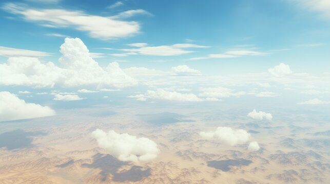 Aerial view of vast desert landscape under a bright blue sky adorned with fluffy clouds showcasing natural beauty and tranquility.