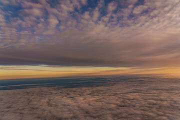 clouds and snow covered alp mountains from sky