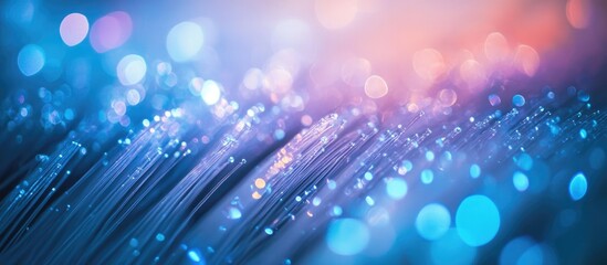 Fiber optic technology background with glowing strands and bokeh effects representing advanced telecommunications infrastructure.