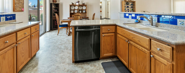 Cozy and bright kitchen with modern appliances and warm wooden cabinets