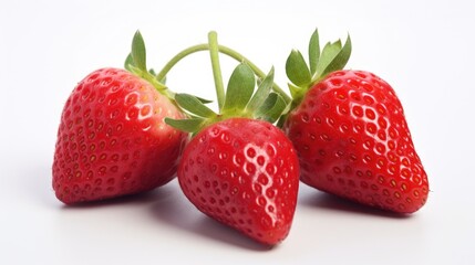 Fresh red strawberries arranged on a white background showcasing their natural beauty and vibrant color ideal for food-related designs.
