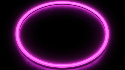 Obraz premium A glowing pink neon circle against a dark background, creating a vibrant and modern visual effect.