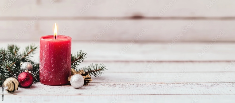 Aufkleber burning red candle with fir branches and festive decorations on a white wooden background ideal for 