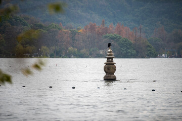 person sitting on a pier