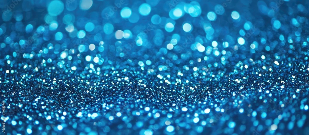 Leinwandbilder sparkling blue glitter background for festive and creative designs with a vibrant bokeh effect suita