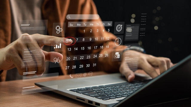 Business Planning Calendar and Project management concept. Businessman manages time for effective work. Calendar on the virtual screen interface. Time management. Reminder appointment.