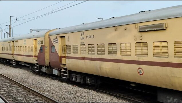 Delhi, India, November 02 2024 - Indian railway express train at departure from Anand Vihar railway station during morning time, Colourful Express train at Delhi railway station