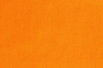 Orange fabric cloth texture for background, natural textile pattern.