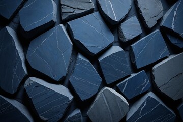 Fototapeta premium a close up of a pile of blue rocks with a black background