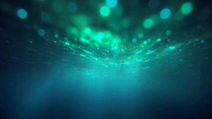 Obraz premium Underwater Light Reflections Creating Enchanting Abstract Blue and Green Background