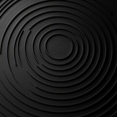 Fototapeta premium Circular black design with concentric lines creating a modern and elegant pattern.