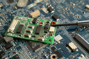Obraz premium Repairing and upgrade circuit mainboard of notebook, electronic, computer hardware and technology.
