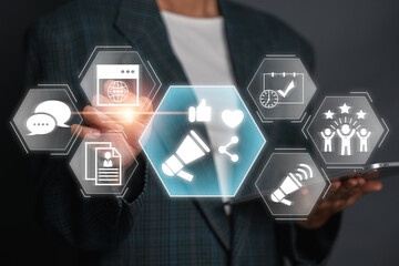 A business professional interacts with digital icons representing public relations strategies and...