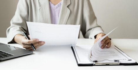 Business woman employer holding resume hiring recruit looking cv resume to hire candidates,...