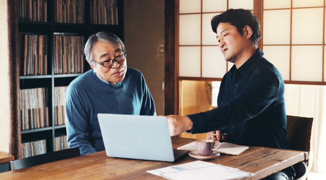 People, laptop and meeting in home for finance, payment management and advice in retirement. Senior man, Japanese broker or tech in living room for investment feedback, problem solving or budget help