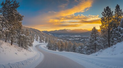 Sunset view on snowy road through forest