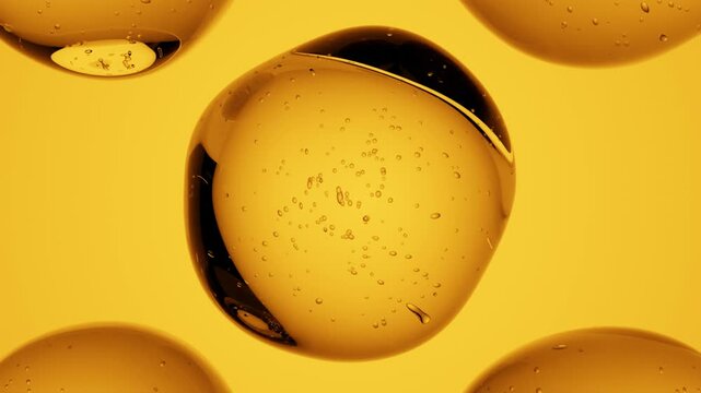 Abstract 3d Animation for Science and Cosmetics Motion Design. Transparent liquid drops with little air bubbles inside on an Orange background