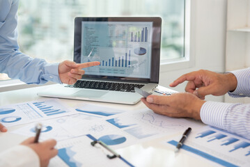 accountant or business people are calculate valuation and appraisal value of property business company and stock.