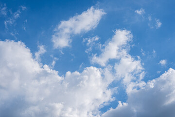 Obraz premium clouds and blue sunny sky, white clouds over blue sky, Aerial view, nature blue sky white cleat weather.