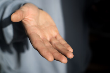 Obraz premium Man's hands, help gesture, open attitude 