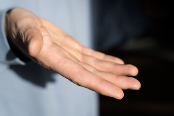 Fototapeta premium Man's hands, help gesture, open attitude 