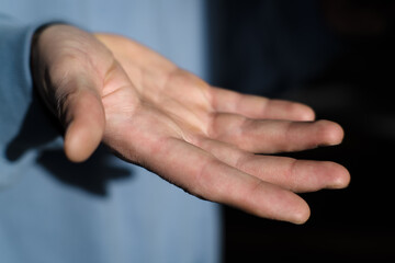 Fototapeta premium Man's hands, help gesture, open attitude 