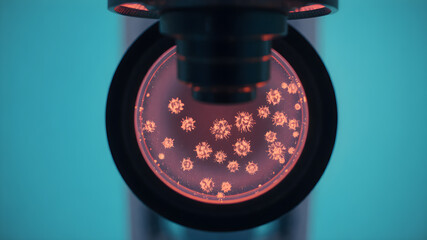 Close-up of a microscope lens focusing on a glass slide.science laboratory.